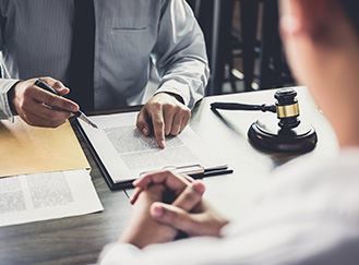 People looking over paperwork